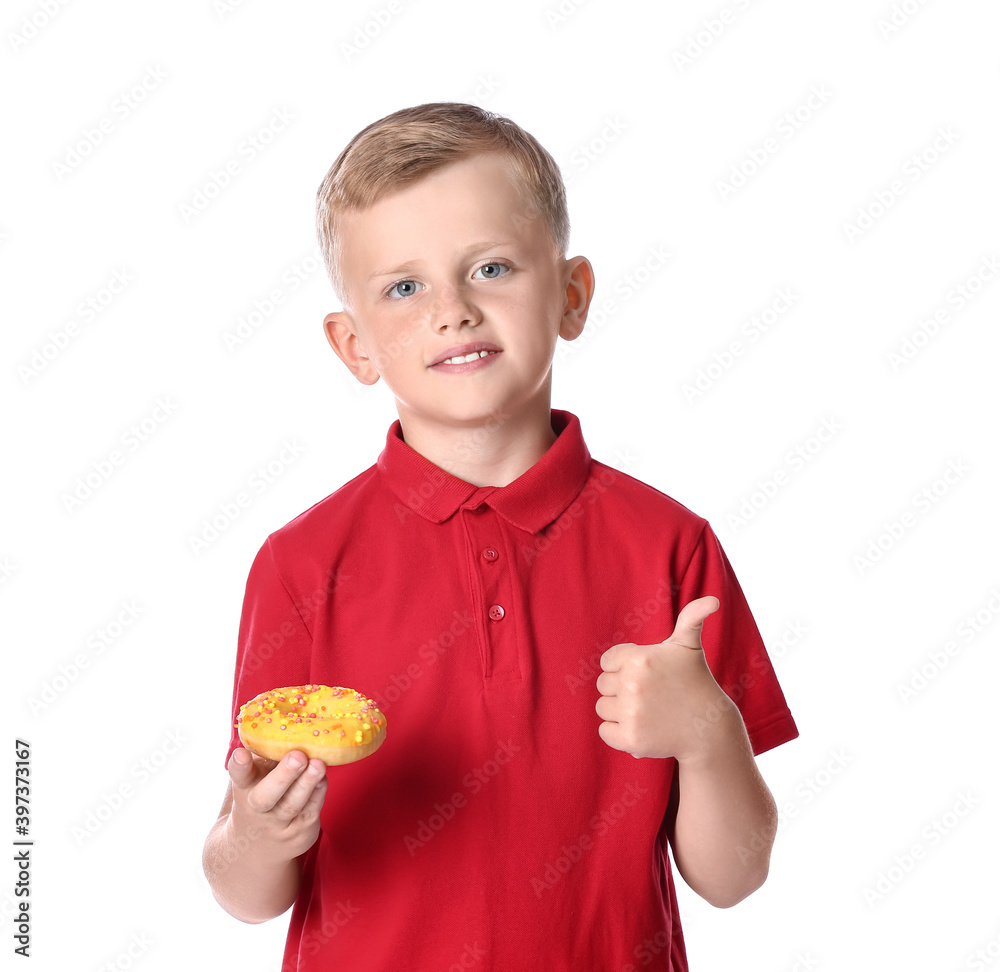 Funny little boy with donut on white background