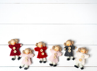 Wall Mural - small handcrafted dolls