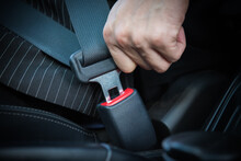 Hand Fastening Seat Belt In The Car