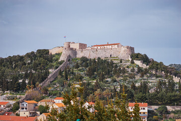 Wall Mural - Ancient fortress at Hvar island over town (citadel), popular touristic attraction of Adriatic coast, Croatia