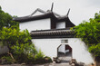 Traditional Chinese house and octagonal gate on Tiger Hill (Huqiu), Suzhou, Jiangsu, China