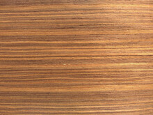 Natural Light Coral Louro Preto Wood Texture Background. Veneer Surface For Interior And Exterior Manufacturers Use.