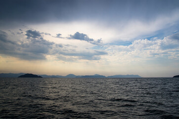 Wall Mural - Seascape with islands on the horizon