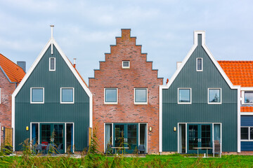 Wall Mural - Volendam is a town in North Holland in the Netherlands. Colored houses of marine park in Volendam.