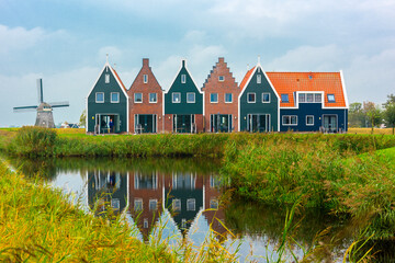 Wall Mural - Volendam is a town in North Holland in the Netherlands. Colored houses of marine park in Volendam.