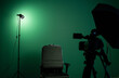 Green screen background and a black chair in a television Studio.