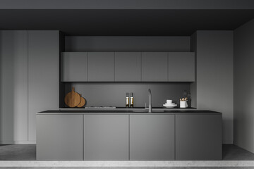 Dark gray kitchen interior with island