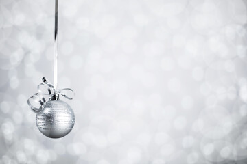 Wall Mural - Silver Christmas ball with ribbon