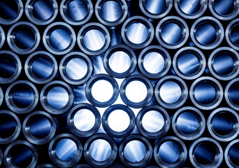 Wall Mural - Abstract background of steel pipes stacked on a pallet