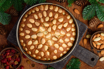 Wall Mural - Christmas Fruit cake. Traditional Scottish Dundee Cake. Selective focus. Top view. Christmas baking concept. 