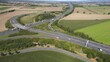 Luftaufnahme des Autobahndreiecks Dramfeld Deutschland mit Verkehr an einem sonnigen Tag im Sommer