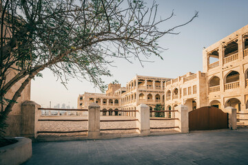 Wall Mural - Doha city street with traditional Islamic architecture buildings