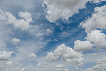 Wall Mural - white, fluffy clouds in blue sky. background from clouds