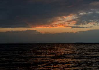 Beautiful sunset with clouds and sea.