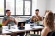 © Syda Productions - business, people and corporate concept - team of startuppers drinking coffee at office