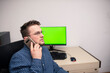 © FarukPhotography - Young caucasian businessman in blue shirt is talking on phone with someone. Businessman is trying to help someone to solve the problem.