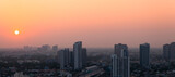 Fototapeta Miasta - arrival view  sunset in the city 