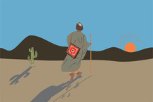 Muslim Traveler Dervish Silhouette Walking On Dry Soil And Desert The Man Is Walking Toward Sunset Direction With The Saddlebags And Scepter. The Man Is Wearing A Turban And Robe. Cactus In The Desert