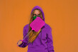 © VISTA by Westend61 - Teenage girl wearing protective face mask with fly sticker, holding swatter