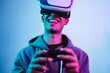 Young gamer playing to new video games with virtual reality experience - Youth people entertainment and technology concept