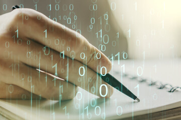 Leinwandbilder - Creative abstract binary code hologram and man hand writing in diary on background, AI and machine learning concept. Multiexposure