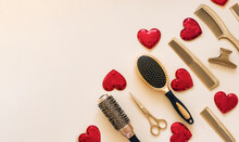 Valentines Day Template With Hairdressing Tools And Hearts. Gold Hair Salon Accessories In The Corner On A Light Beige Background With Space For Text.