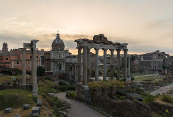 Wall Mural - Sunrise landscapes of the empty Roman Forum, view of the Temple of Vespasian and Titus