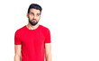 © Krakenimages.com - Young handsome man with beard wearing casual t-shirt smiling looking to the side and staring away thinking.