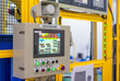 © Nay - Factory 4.0 concept : View of operation panel and product inspection monitoring display on fence of manufacturing machine