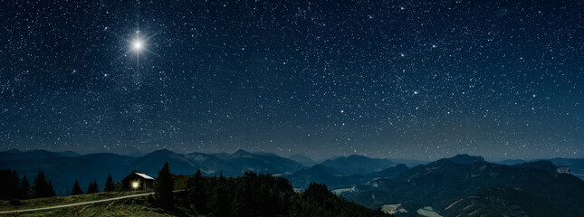 Wall Mural - the star shines over the manger of christmas of jesus christ.