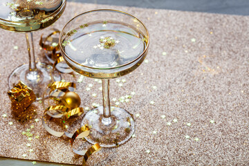 Golden party time background with champagne, closeup