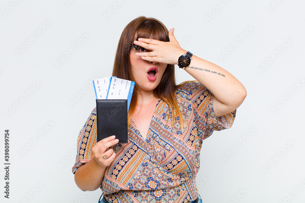Finger Getting Zapped plus size woman looking shocked, scared or terrified, covering face ...