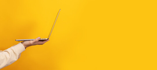 hands with laptop isolated on background