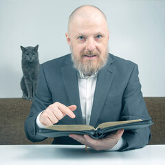 happy bearded man studies the Bible. religion and Christianity