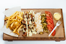 Turkish Shawarma On A Wooden Board And Light Background