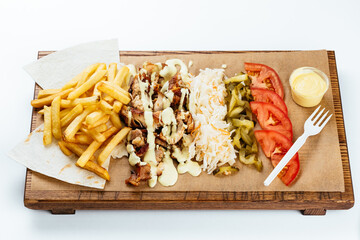 Turkish Shawarma on a wooden Board and light background