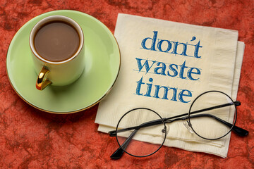 Wall Mural - do not waste time - inspirational handwriting on a napkin with a cup of coffee, business, procrastination and productivity concept