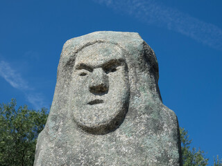 Old stone figur called menhir. Filitosa is now an open-air museum. The site was once used for religious purposes and has many stone carved figures. Corsica, France