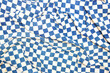 © asajdler - Blue checkered wrinkled fabric