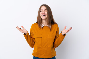 Wall Mural - Young woman over isolated white background smiling a lot