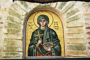 Wall Mural - Mosaic of Saint Paraskevi outside of  an old byzantine orthodox church in Athens, Greece, March 12 2020.