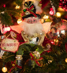 Wall Mural - christmas tree decoration of a Santa's elf with a sign that says HUMBUG!