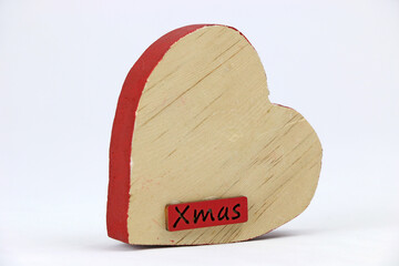 A wooden christmas heart on white background.