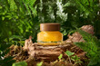 Cosmetic jar on nature background