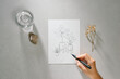 © Maki Company Limited/Stocksy - artist hands with graphite pencil drawing still life picture on paper at studio