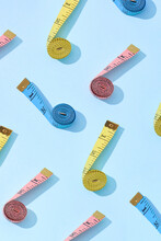 Colorful Measure Tapes Pattern With Shadows.