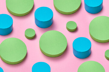 Horizontal backdrop from paper circles and cylinders.