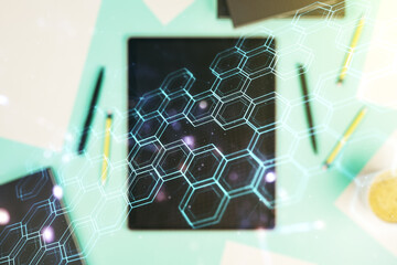 Poster - Double exposure of technology hologram with hexagon and digital tablet on background, top view. Research and development software concept