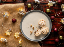 Flat Lay Of Yummy Mince Pies Served On A Plate, Surrounded With Bright Christmas Decorations