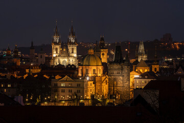 .light from street lights and a view of the city of Prague